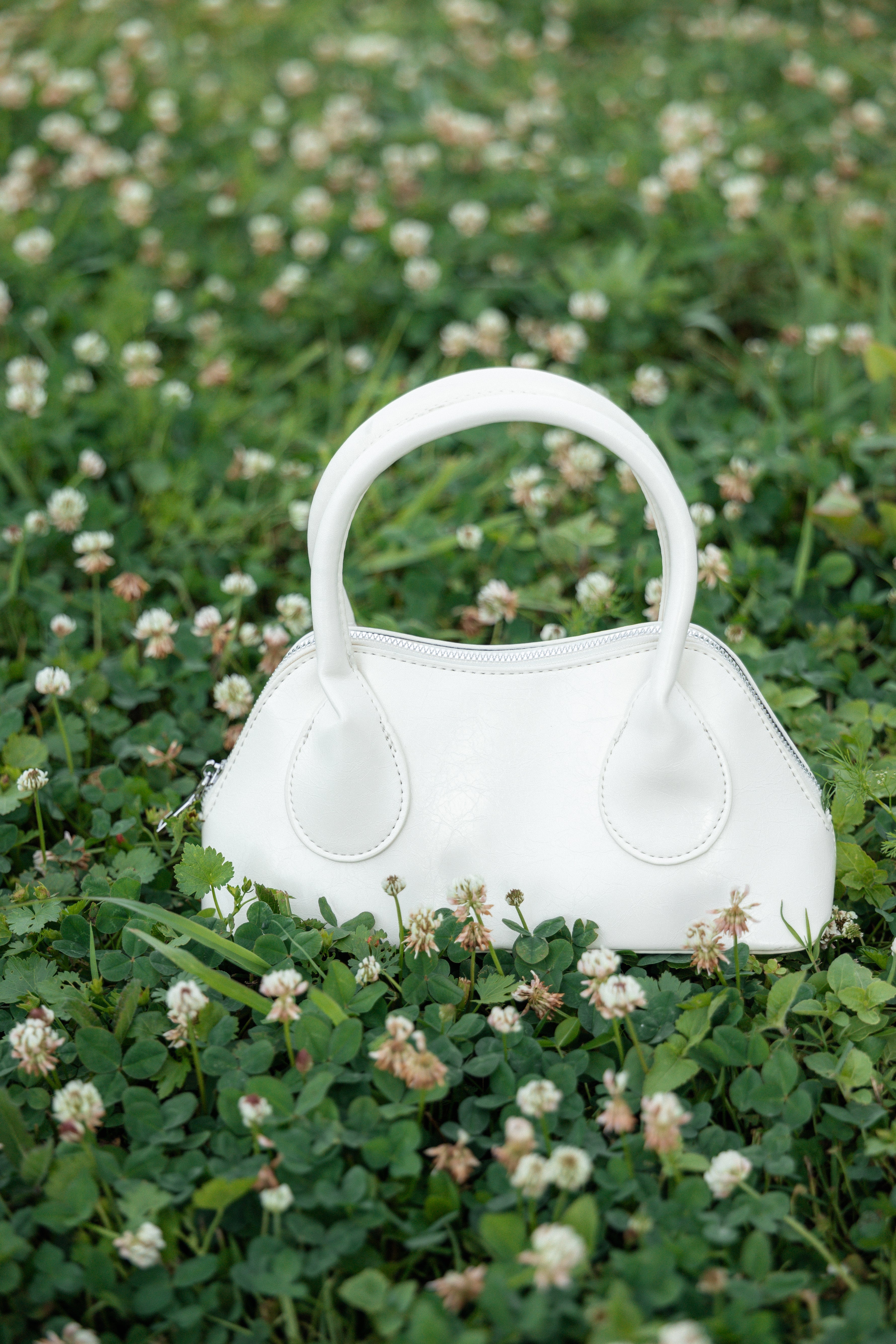White Carolyn Handbag with Detachable Strap & Zip Closure