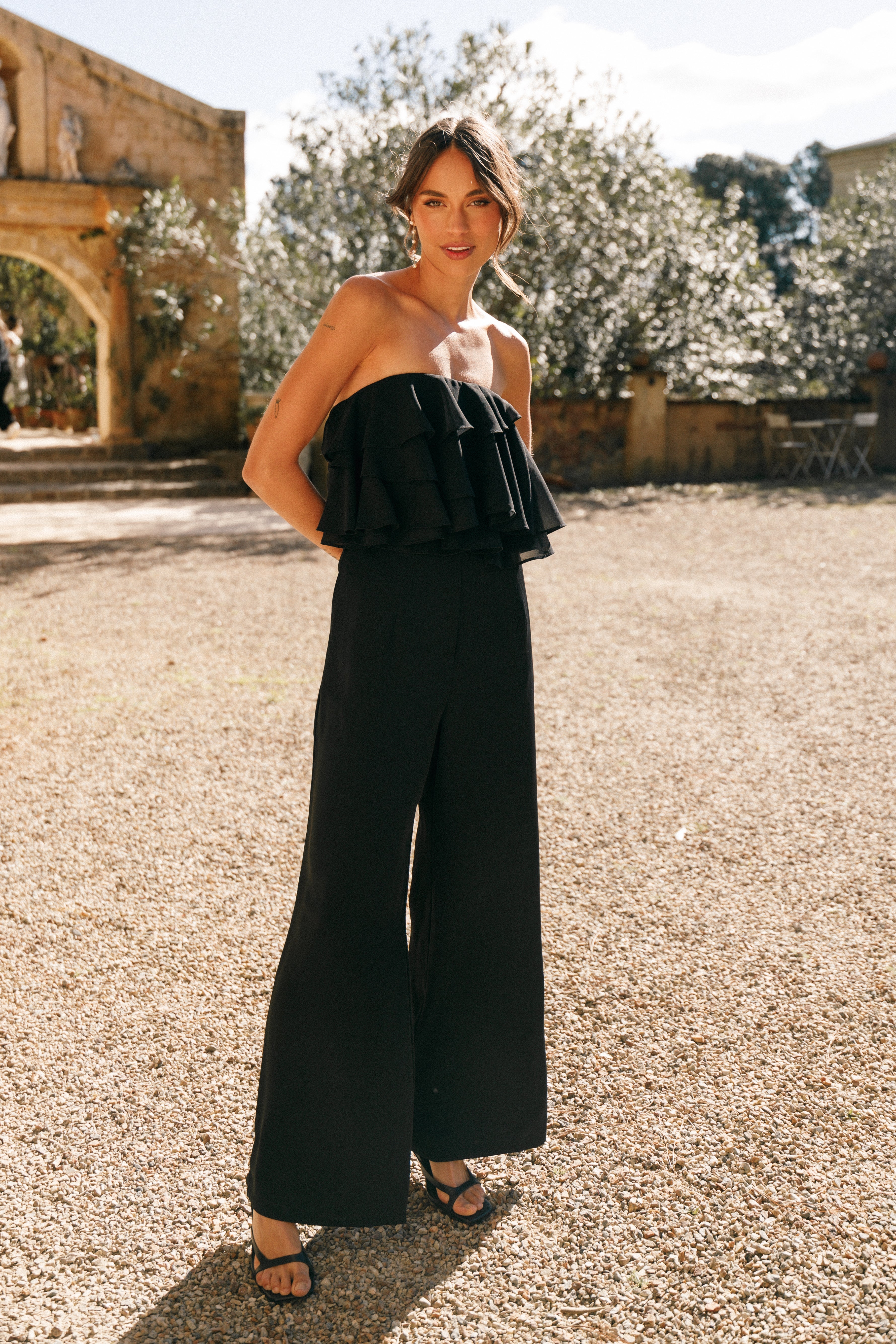 Black Strapless Jumpsuit with Ruffle Detail - Georgiana