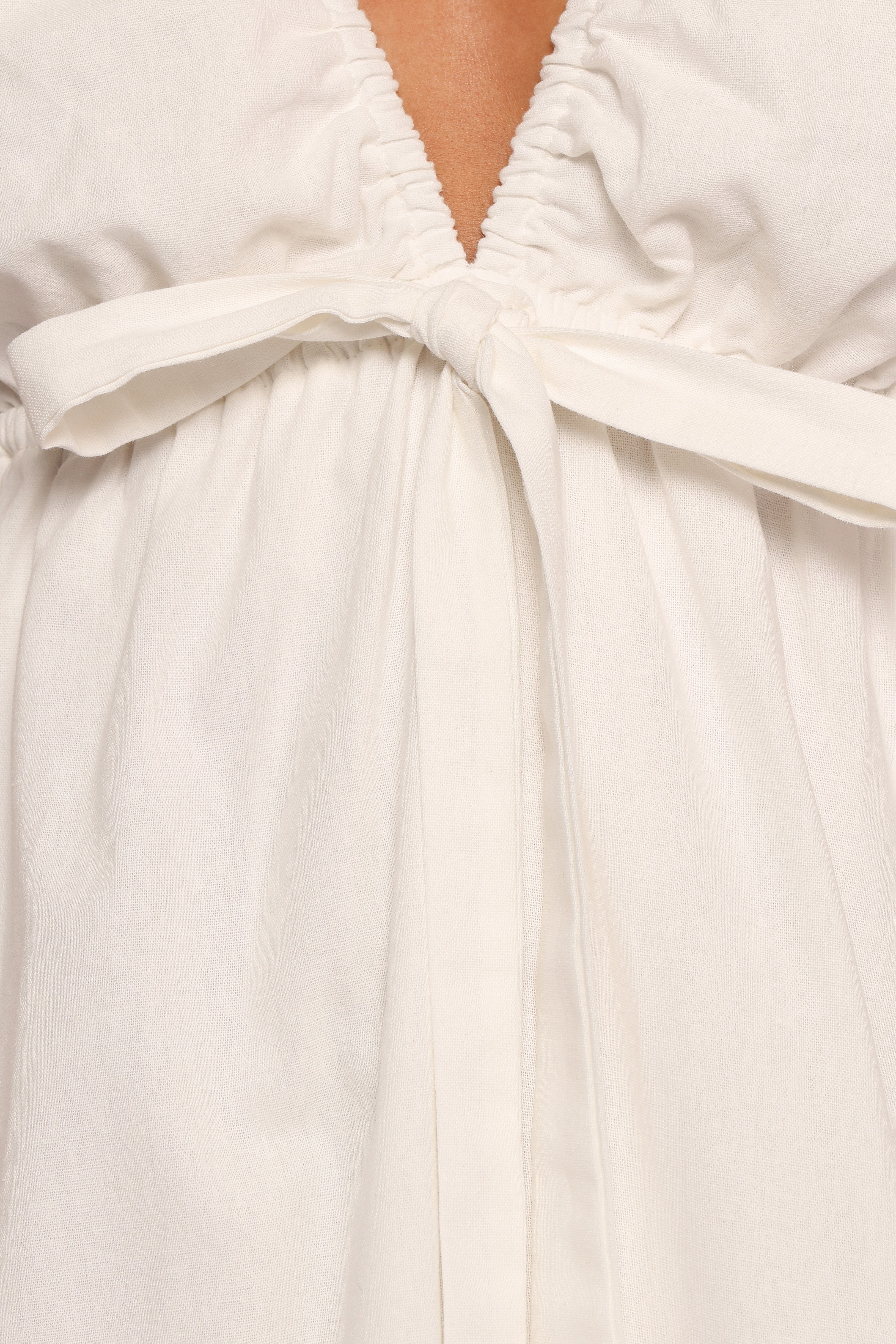 White Kathy Mini Dress with V Neckline & Bow Tie Detail