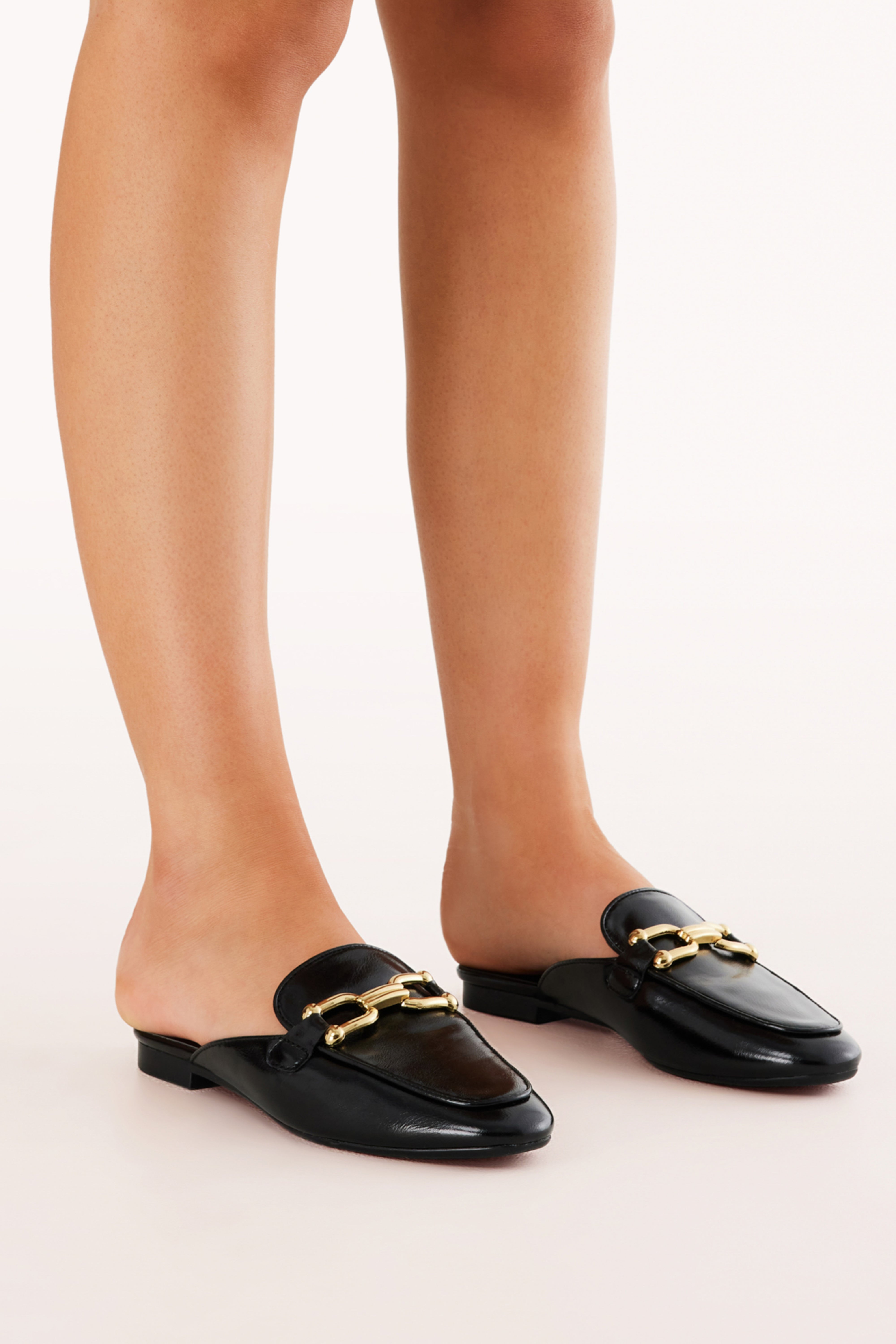 Enza Black Slip-On Mules with Gold Detailing