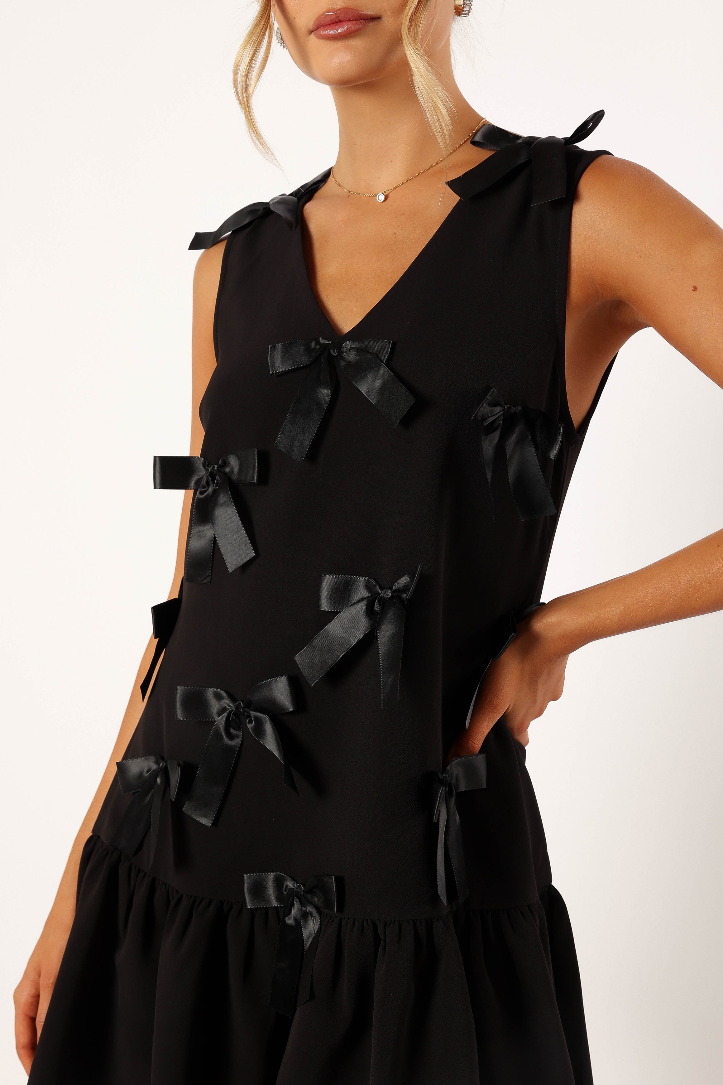 Black Juniper Mini Dress with V Neckline & Bow Details