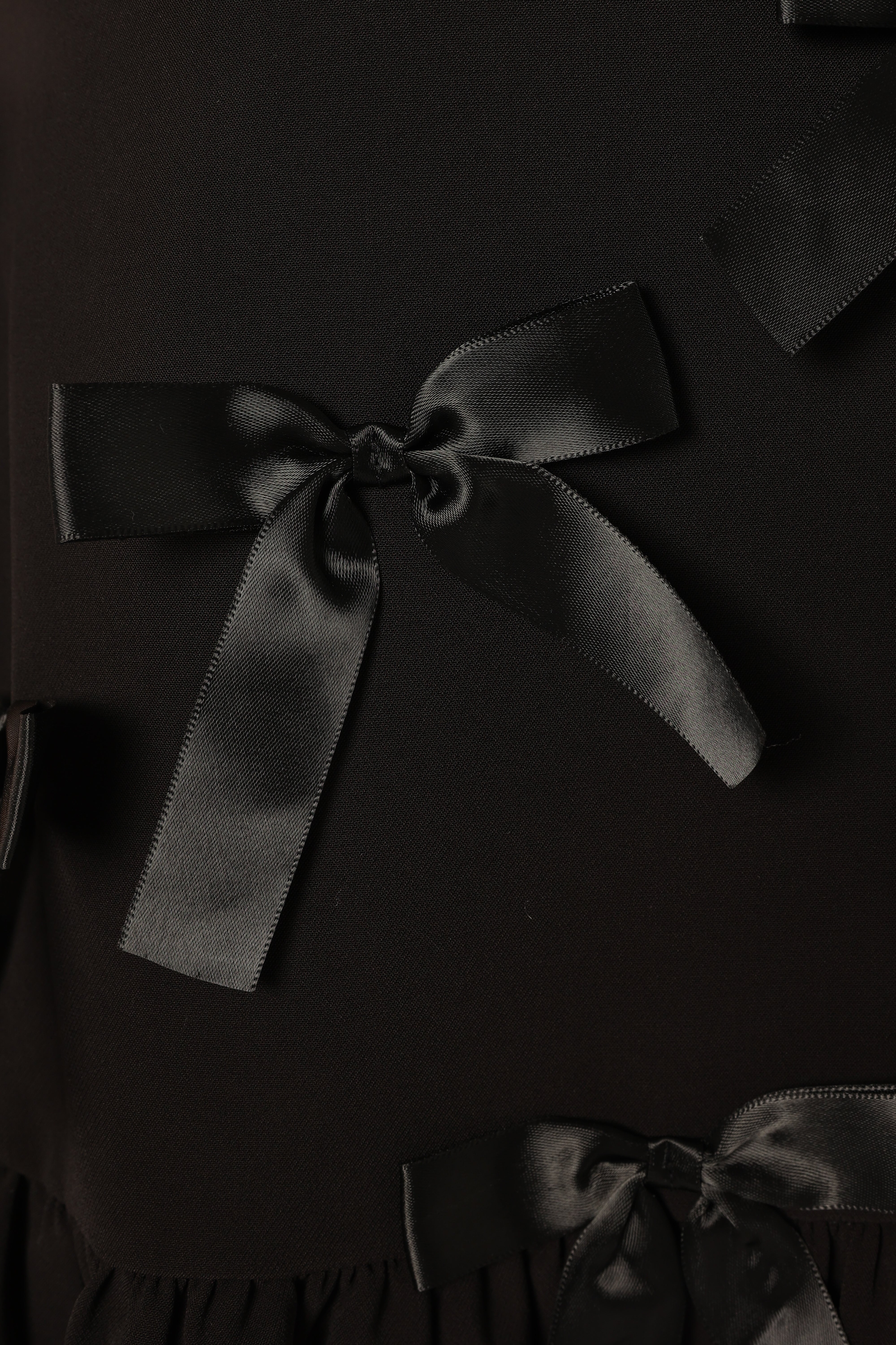 Black Juniper Mini Dress with V Neckline & Bow Details