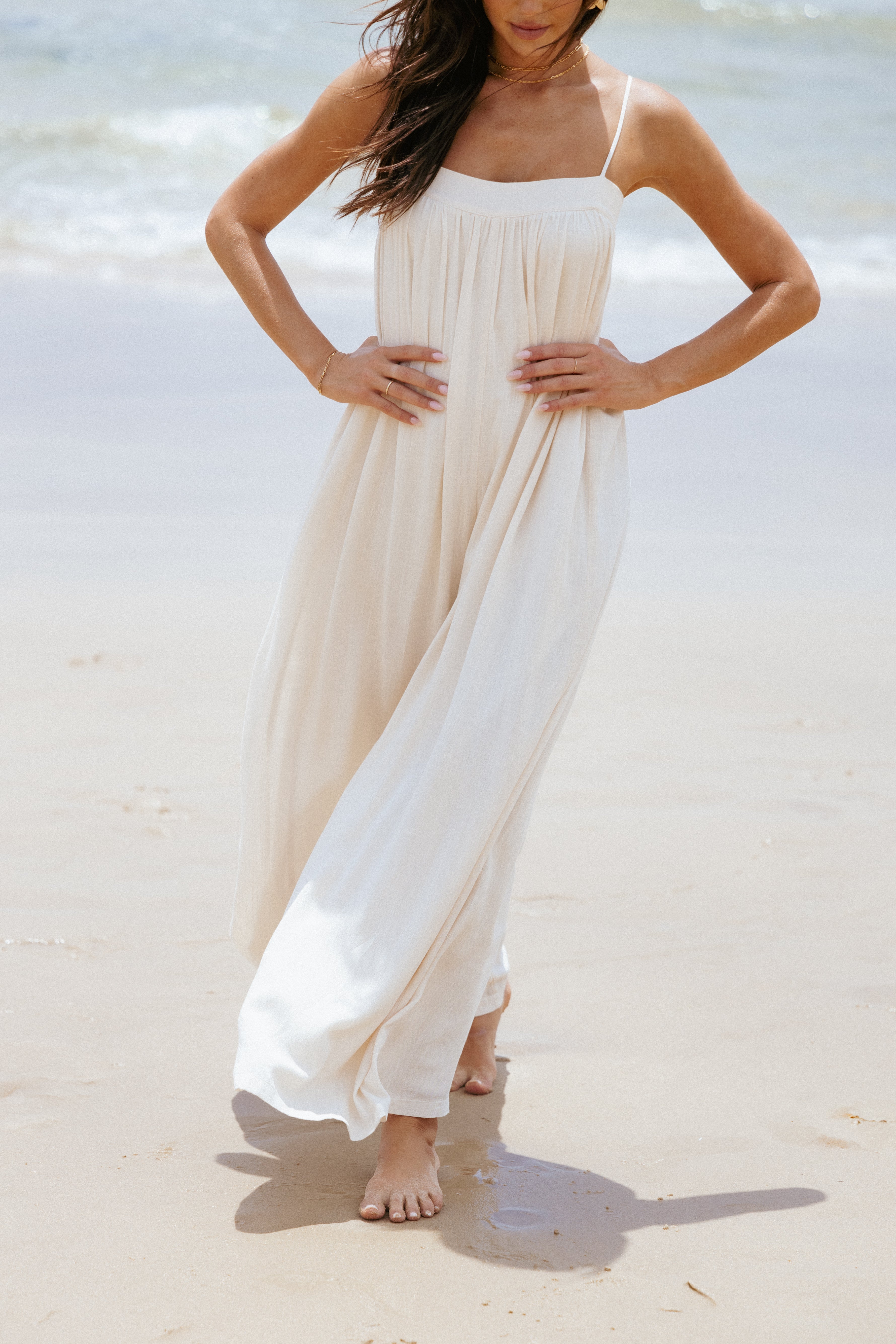 Abegail Cream Flowy Jumpsuit with Adjustable Straps & Wide Leg